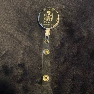 "I'm fine it's fine everything is fine" skeleton badge reel